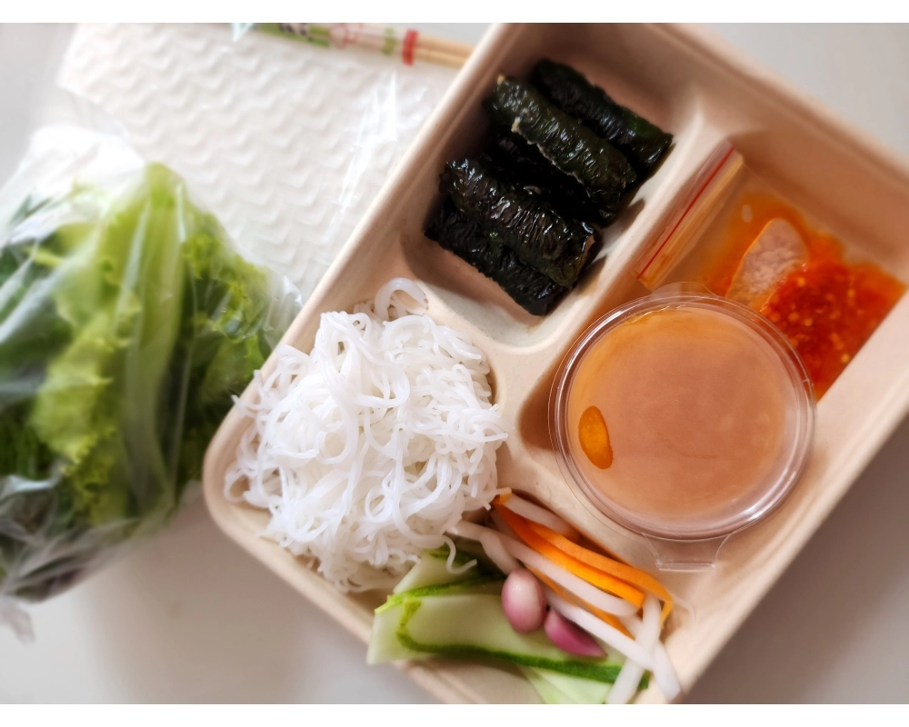 Ong U Grilled meat wrapped in betel leaves